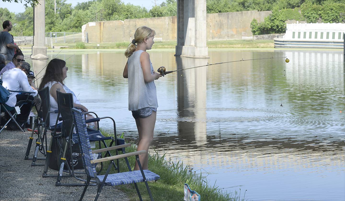 The banks were crowded on the canal at Lock 14 in La Salle with families fishing Saturday, June 3, 2023, during the 36th annual Kid's Fishing Tournament in La Salle.