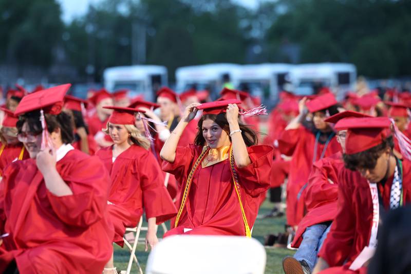 Graduates battle some wind as they turned their tassels during the Bradley-Bourbonnais Community High School commencement ceremony on Thursday, May 21, 2026.
