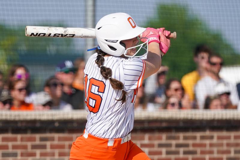 Oswego’s Rikka Ludvigson (16) singles against Wheaton North during a Class 4A Oswego Sectional Final game at Oswego High School on Friday, June 6, 2025.