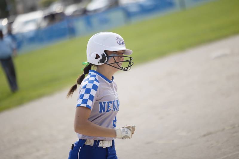 Newman’s Madison Duhon is all smiles as she rounds third after hitting a two-run homer against Putnam County Thursday, May 18, 2023.