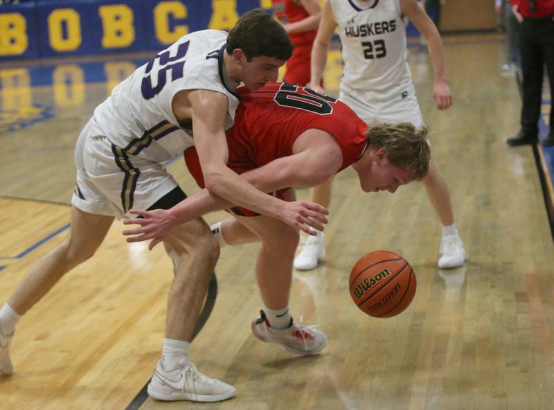 Serena's Richie Armour looses control of the ball as Earlville's Griffin Cook lets it go out of bounce during the Little Ten Conference Championship on Friday, Feb. 2, 2024 at Somonauk High School.