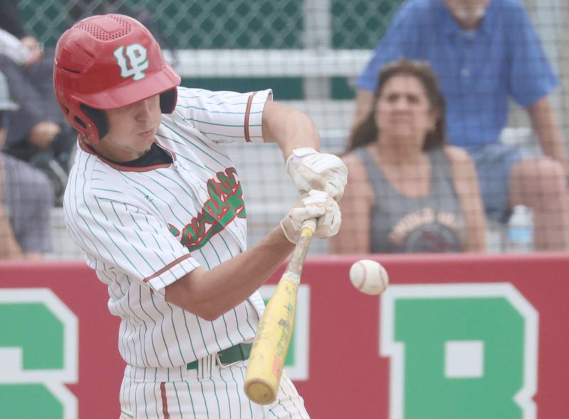 L-P's Gray Ernat blasts a double against Morris on Friday, April 17, 2026 at Huby Sarver Field in the L-P Athletic Complex in La Salle.