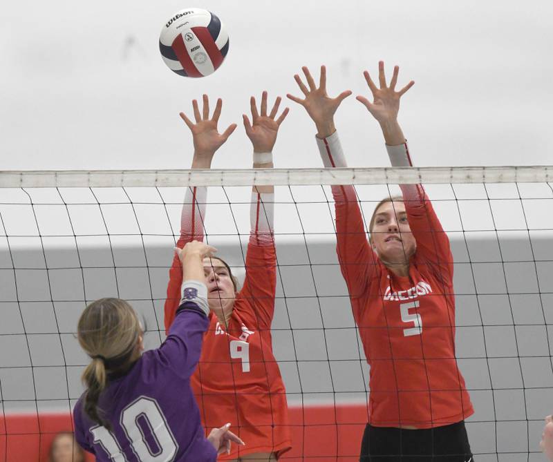 Oregon's Hayleigh Heuerman (9) and Skylar Bishop (5) block against Rockford Lutheran at the Stillman Valley Tournament on Saturday, Oct. 25, 2025 at Stillman Valley High School.