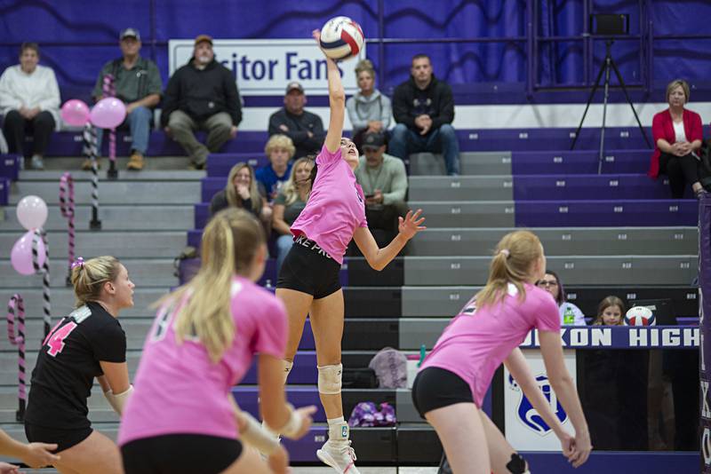 Dixon’s Sydney Hargrave plays the ball over the net against Genoa-Kingston Thursday, Oct. 6, 2022.