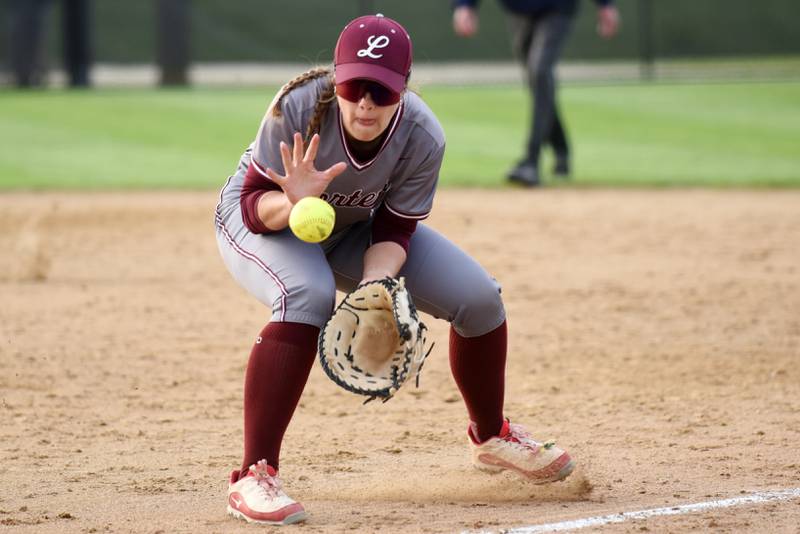 Lockport's Alexis VanderTuuk fields a bunt during a game at Bradley-Bourbonnais Tuesday, April 28, 2026.