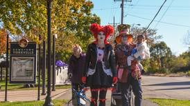 Trick-or-treaters and their families enjoy Yorkville Chamber’s Biz Boo! event