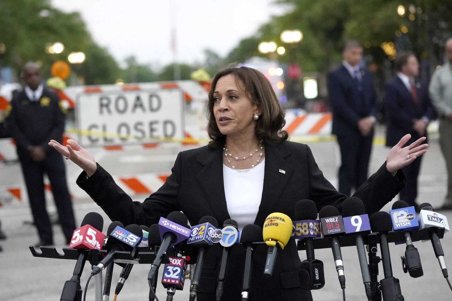 Vice president Kamala Harris speaks to those gathered near the site of Monday's mass shooting during the Highland Park July 4th parade Tuesday, July 5, 2022, in Highland Park, Ill. (AP Photo/Charles Rex Arbogast)