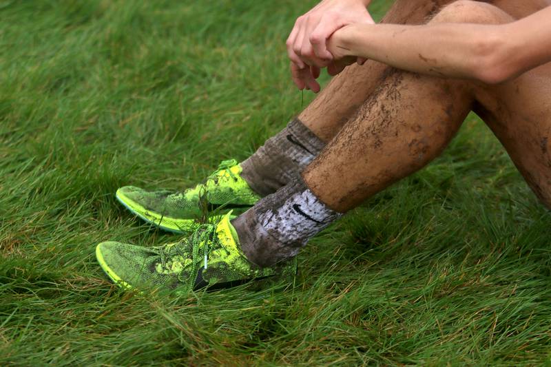 There was plenty of mud on the course during the Fox Valley Conference Cross Country Meet at Plato Park in Elgin Saturday.