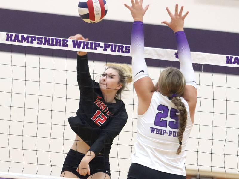 Huntley’s Summer Massow hits the ball in varsity girls volleyball at Hampshire High School in Hampshire on Tuesday, Sept. 23, 2025.