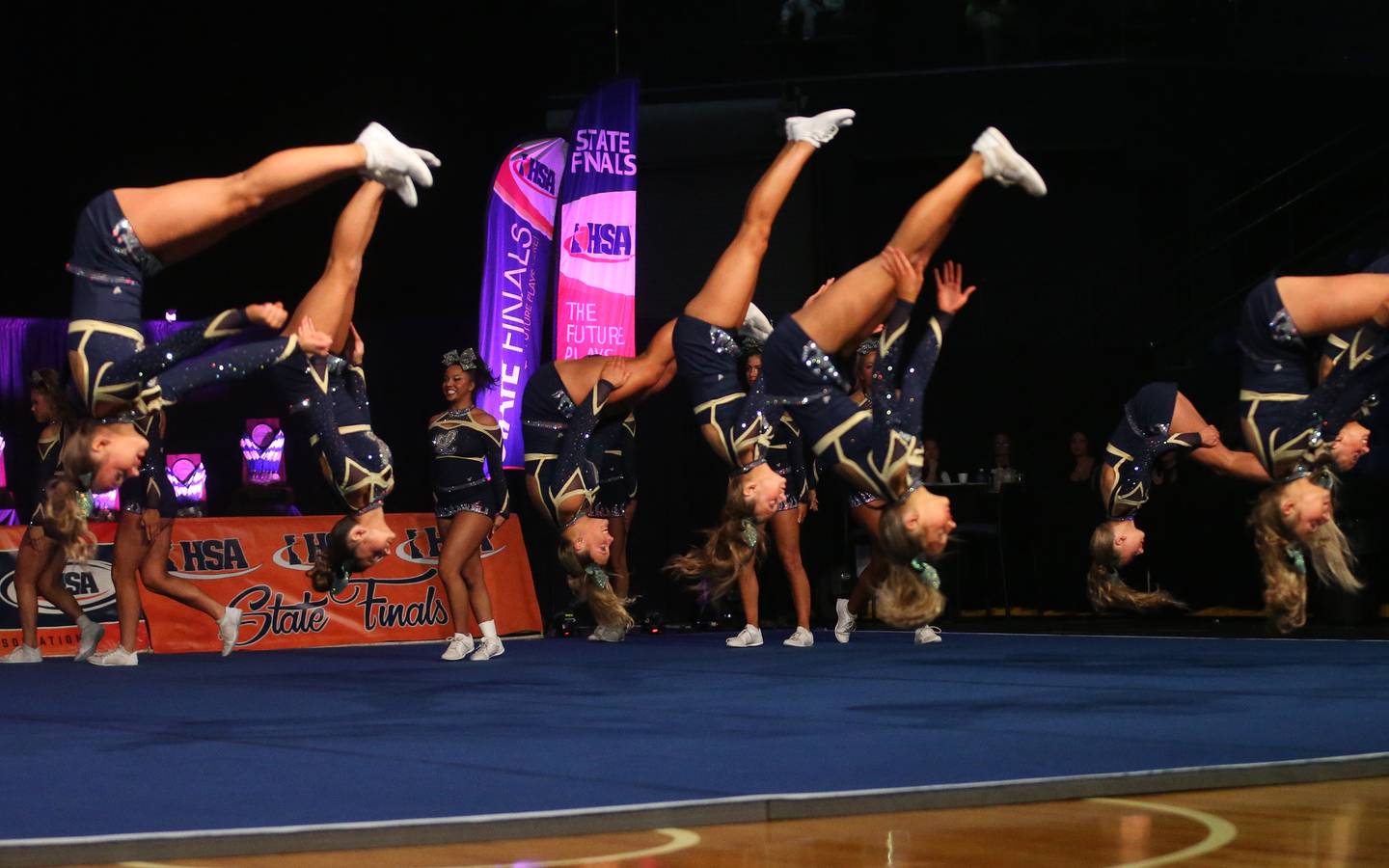 Members of the Lemont cheerleading team perform at the Competitive Cheerleading State Final Competition on Saturday, Feb. 3, 2024 at Grossinger Motors Arena in Bloomington.