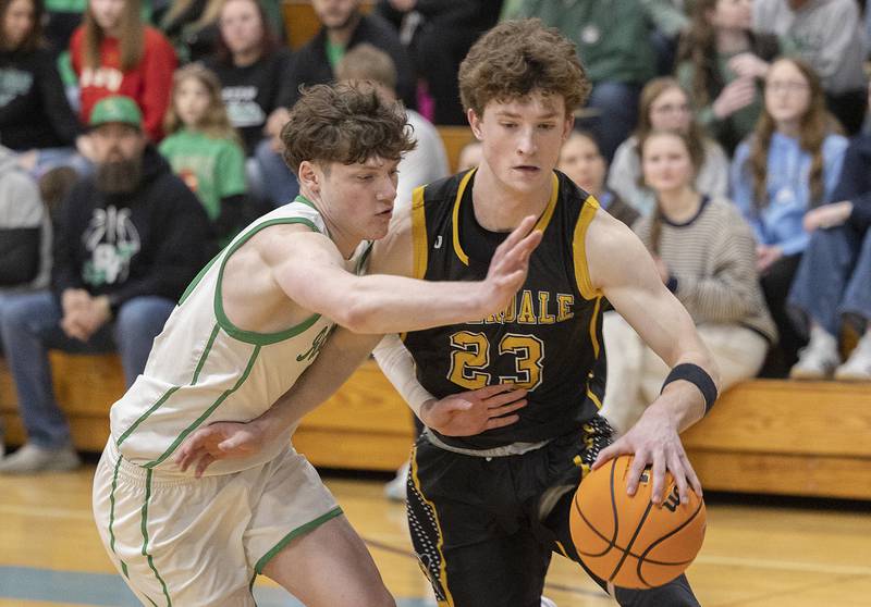 Riverdale’s Jacob Watson handles the ball against Rock Falls’ Ryken Howard Friday, Feb. 28, 2025, during the Class 2A Regional final at Bureau Valley High School.