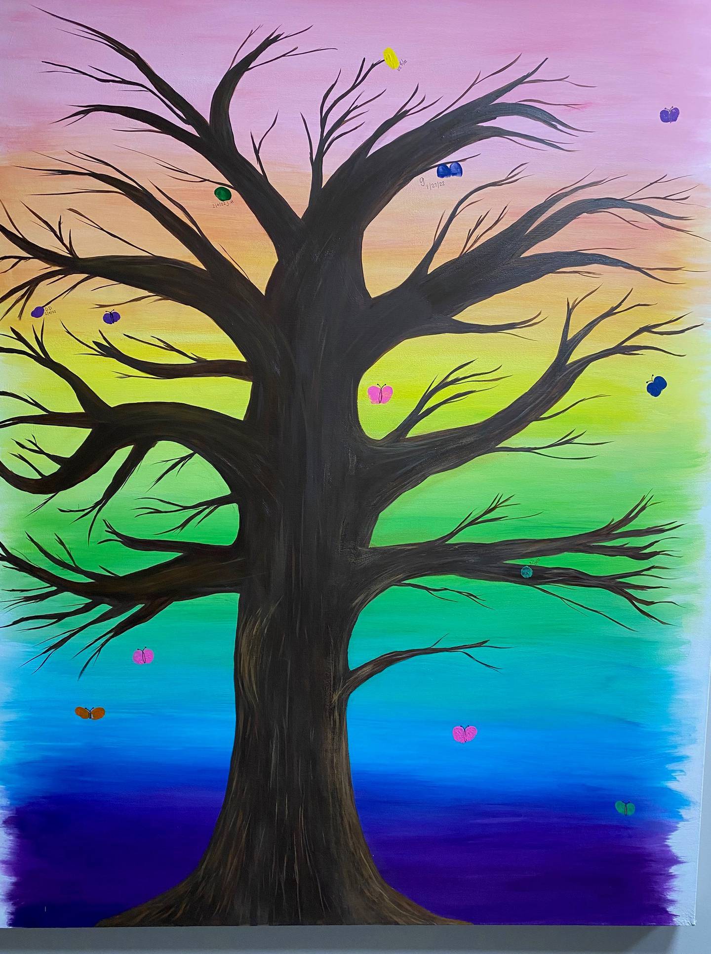 Three canvases of painted acrylic trees now hang on the hallway wall leading to the treatment room of the Radiation Therapy Center of Morris Hospital. Two paintings are “vibrant with colorful leaves,” but the last and largest tree is nearly bare. Staff call it Tree of Hope.