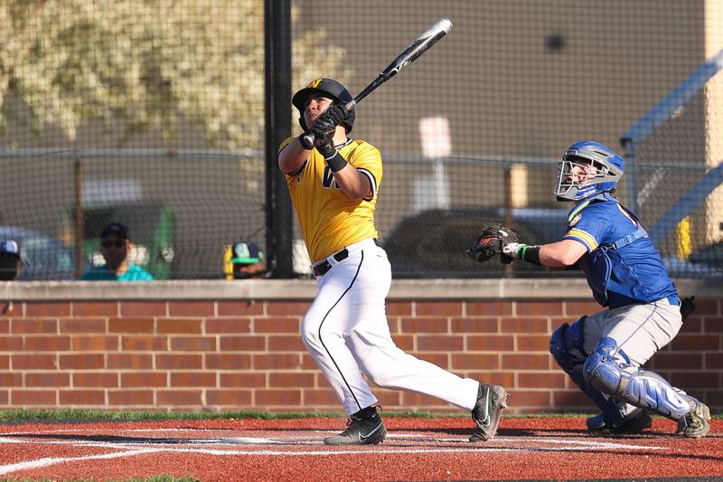 Joliet West’s Jose Leal connects against Joliet Central on Monday, April 15, 2024.