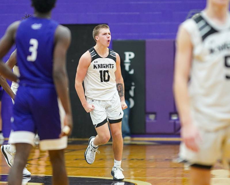 Kaneland’s Troyer Carlson (10) reacts after sinking a three point shot to put his team ahead with seconds left against Plano during the championship game of the 60th annual Plano Christmas Classic Basketball Tournament at Plano High School on Saturday, Dec 30, 2023.