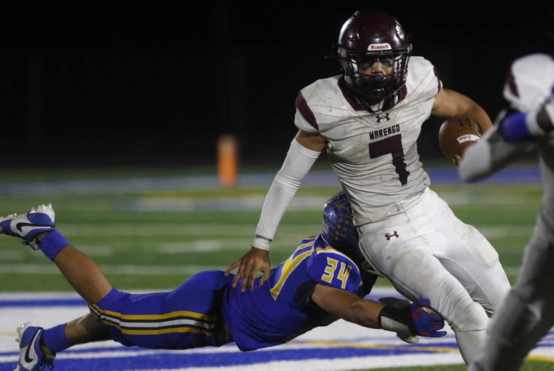 Johnsburg's Duke Mays tackles Marengo's Gavin Baros during a Kishwaukee River Conference football game on Friday, Oct. 4, 2024, at Johnsburg High School.