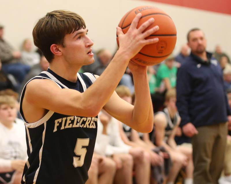 Fieldcrest's Connor Reichman shoots a wide-open three point basket against L-P during the 49th annual Colmone Classic on Friday, Dec. 8, 2023 at Hall High School.