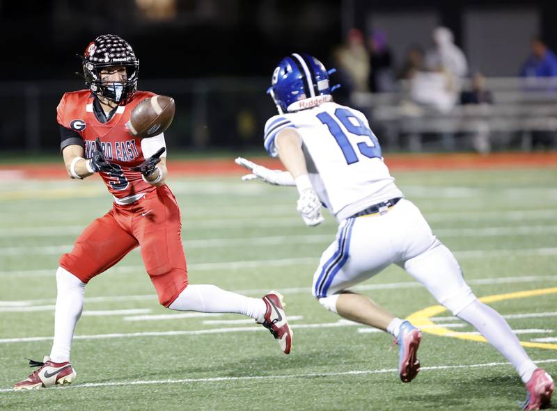 Glenbard East's Muhammad Muselah (3) makes a reception during the varsity football game between Riverside Brookfield and Glenbard East on Friday, Oct. 24, 2025 in Lombard, IL.