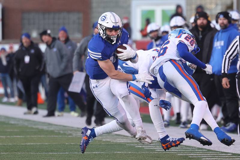 Geneva’s Michael Rumoro sheds a tackle on a catch and run against East St. Louis in the Class 6A state championship on Saturday, Nov. 30, 2024 in Normal.