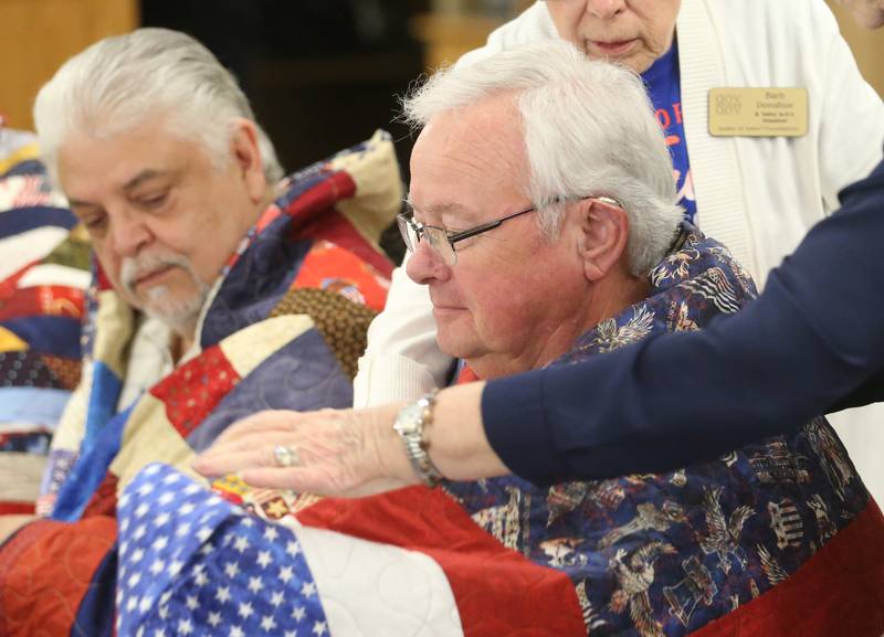 Veteran Bob Reed II, receives his quilt during the Quilt of Valor ceremony on Saturday, April 19, 2025 at the Moose Lodge in Princeton.