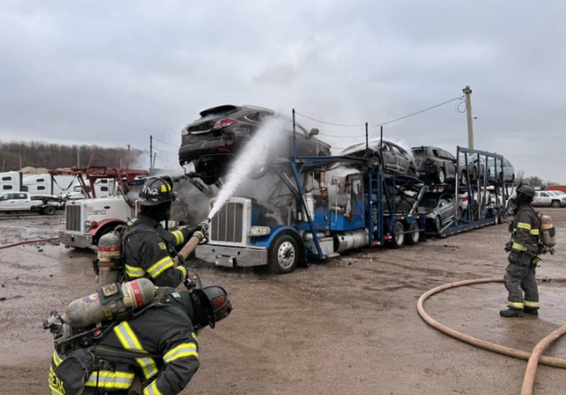 Firefighters with the East Dundee Fire District battle a three semi-truck fire at a storage lot in East Dundee on Dec. 26, 2025.