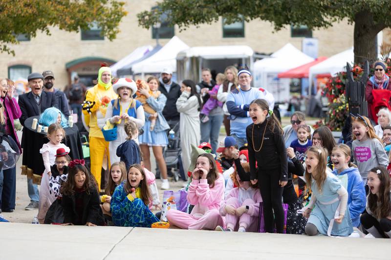 Locals gather for a costume contest at  BatFest on Saturday, Oct. 25, 2025, in Batavia.