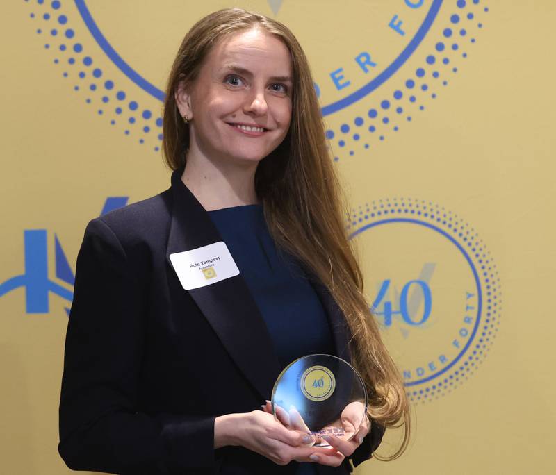 Ruth Tempest poses with her 40 Under Forty award during the Illinois Valley Chamber of Commerce Champions of Change Awards Night on Wednesday, May 6, 2026 at the Westclox Event Center in Peru.