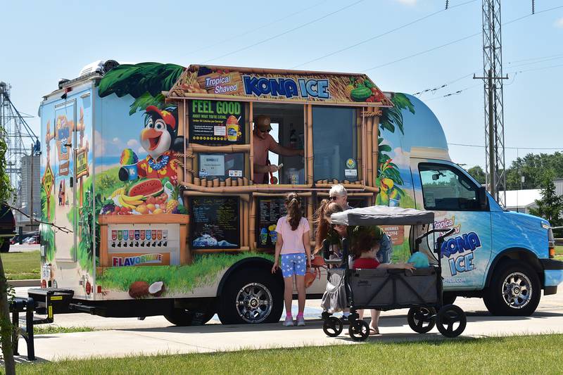 Kona Ice owned by Dalton Hermes of Dixon dishes up shaved ice treats at RB&W Park, Saturday, June 21, 2025, in Rock Falls.