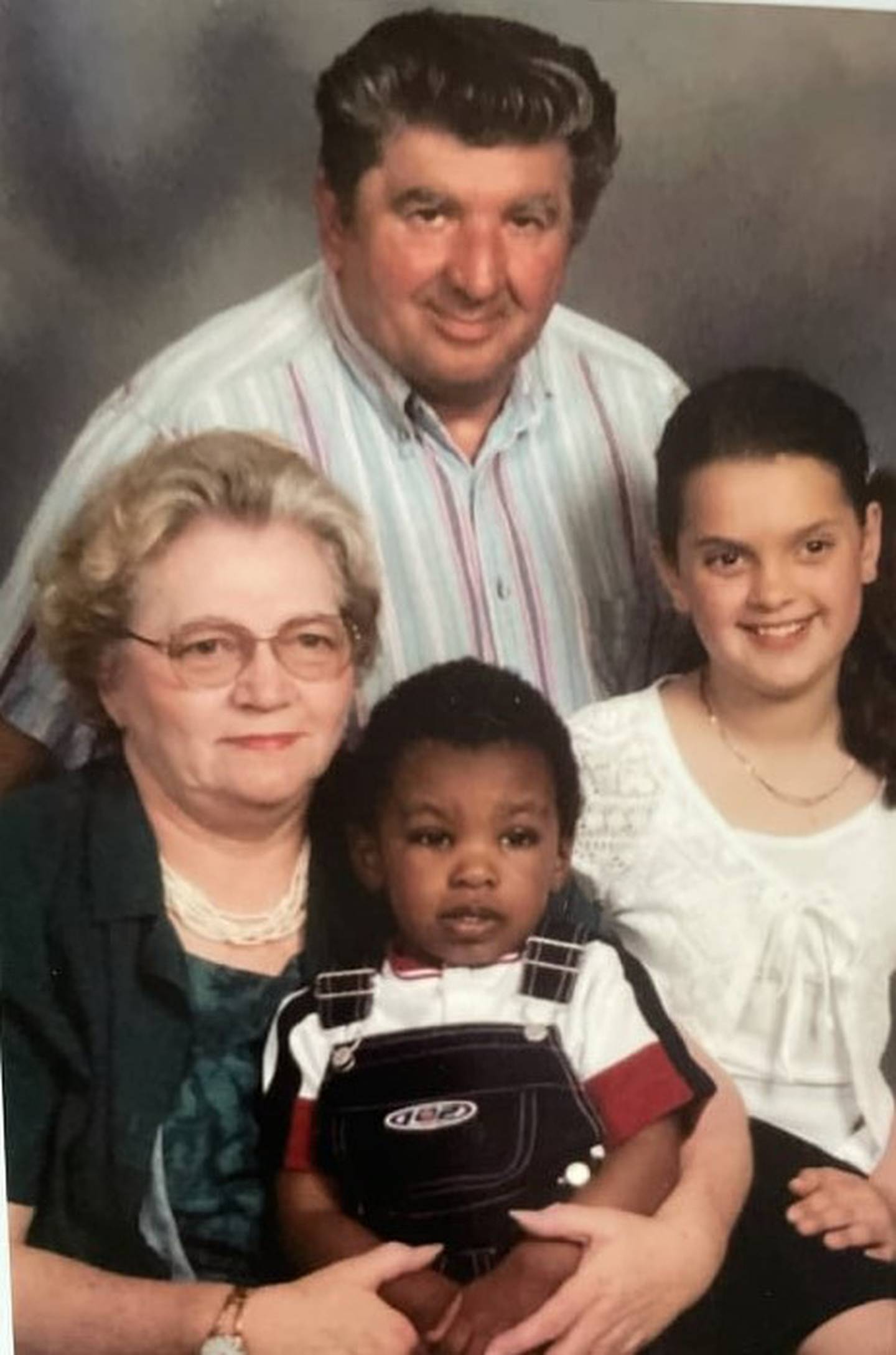 Former Wilmington resident Carol Juricic is pictured with her husband Paul, son Tony and daughter Sheila. Carol and Paul cared for more than 250 foster children over 25 years and adopted four children.