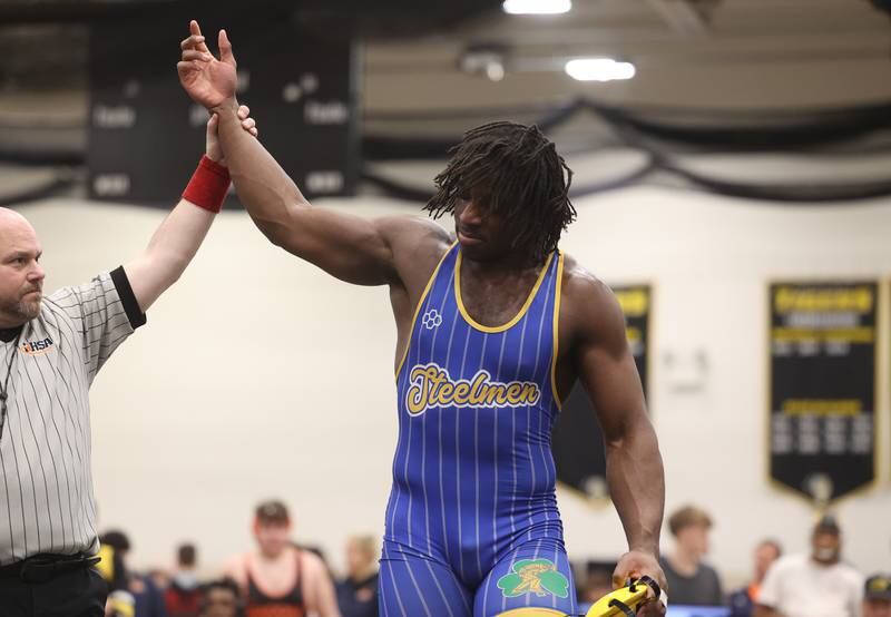 Charles Walker of Joliet Central defeats
Luke Chrisse of Yorkville in the 215-pound weight SPC Conference championship match at Joliet West on Saturday, Jan 25, 2025.