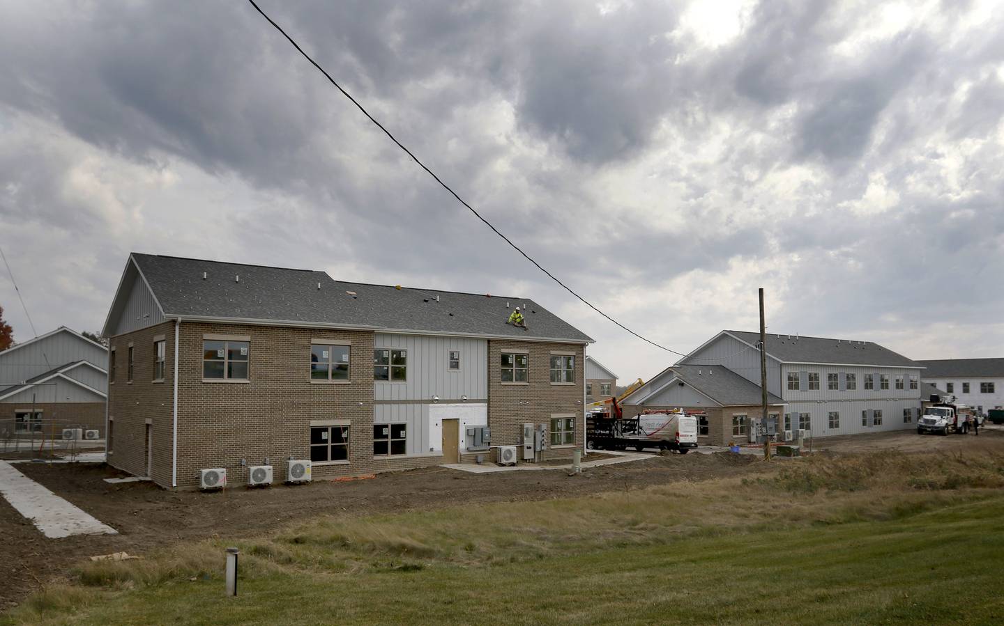 Work continues on General Capital's townhome style rental units at Route 31 and Johnsburg Road on Wednesday, Oct. 30, 2024. The townhomes are clustered in seven-unit buildings and include one-, two- and three-bedroom rentals that are directed at families and young people in the working world.