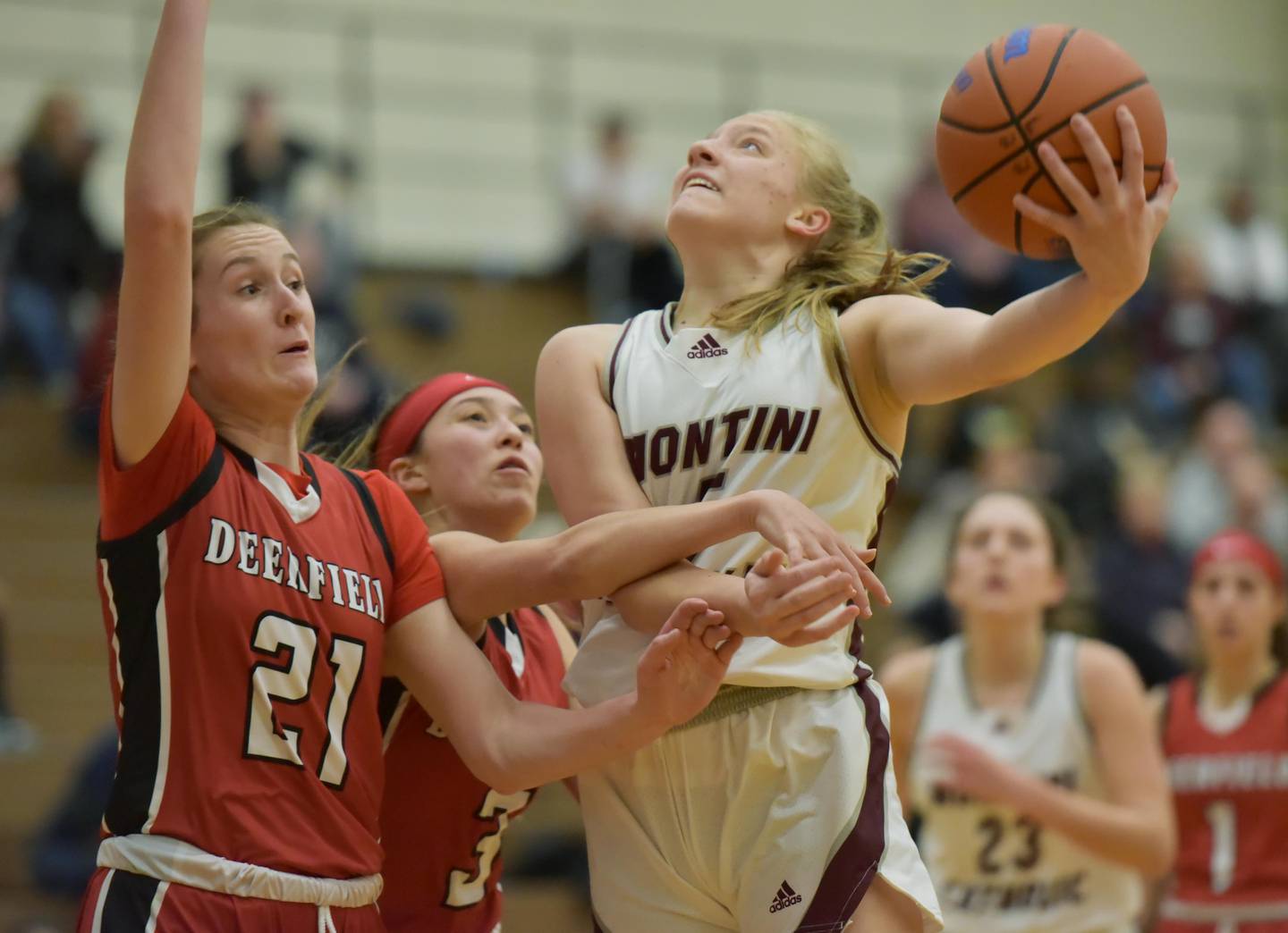 John Starks/jstarks@dailyherald.com
Montini’s Victoria Matulevicius shoots a hook shot against Deerfield’s Olivia Kerndt in the Lake Zurich 2022 Exam Jamm girls basketball tournament on Tuesday, December 13, 2022.