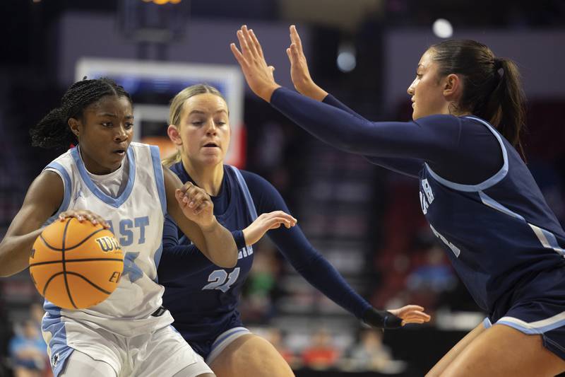 Bellville East’s Ma’Kayla Vinson handles the ball against  Nazareth's Samantha Austin Friday, March 6, 2026, in the Class 4A girls state semifinal game at CEFCU Arena at ISU.