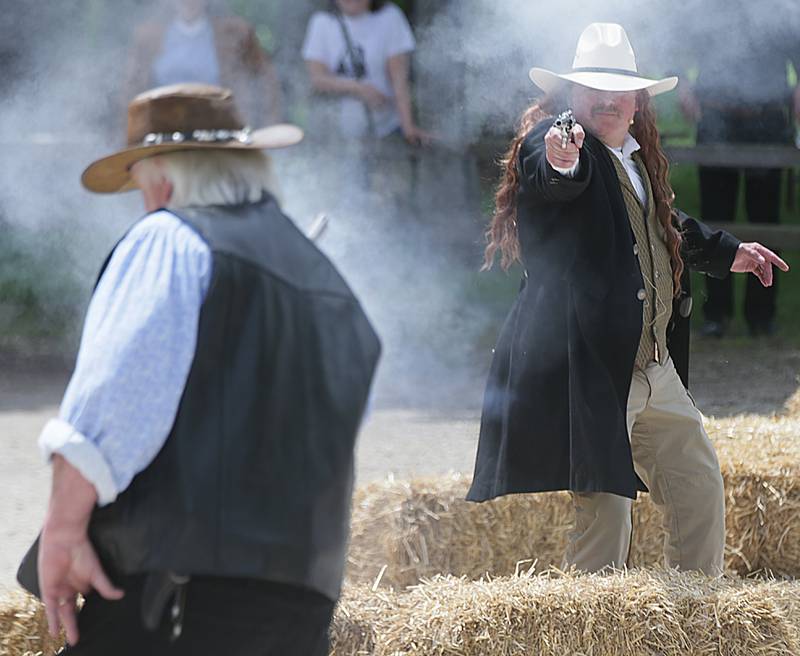 Wild Bill Hickok played by Utica Police Chief Rodney Damron fires a gun to kill a cowboy during the third annual Wild Bill Days, a live re-enactment of Wild Bill Hickok's life and times on Saturday, May 28, 2022 in Utica. The event is held every year to celebrate his birthday on May 27. James Butler Hickok better known as "Wild Bill Hickok" was born on Troy Grove in La Salle County. He is known for his life on the frontier as a soldier, scout, lawman, gambler, showman and actor and for his involvement in many famous gunfights.