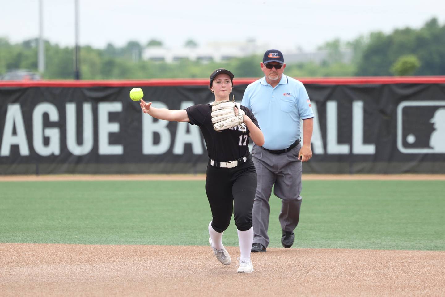 Prairie Ridge's Parker Frey throws to first for an out during the Wolves' 5-0 loss to Glenwood in the IHSA Class 3A state semifinal on June 13, 2025.