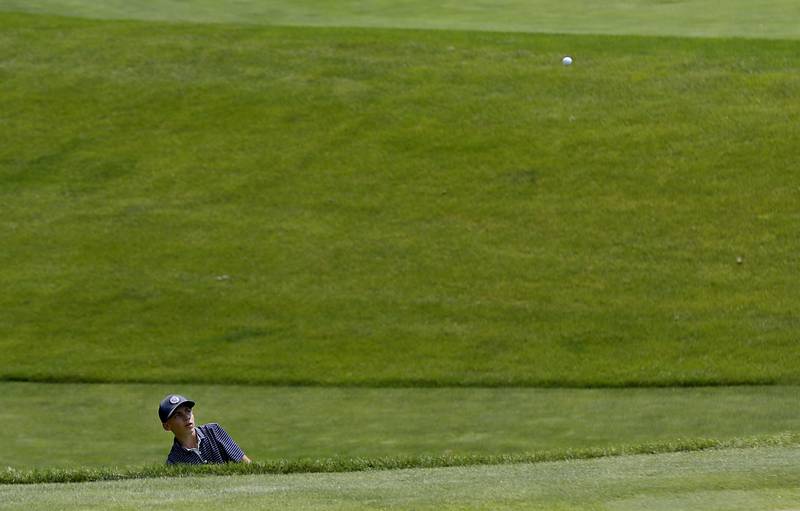 Andrew Karczewski hits onto the fourth green during the final round of McHenry County Junior Amateur Golf Tournament  on Tuesday, July 18, 2025, at Foxford Hills Golf Club in Cary.
