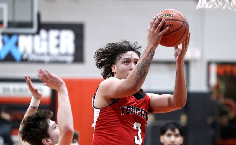 East Aurora’s Jabian Acosta gets the ball to the basket during a game against St. Charles East in the 63rd Annual Ron Johnson Thanksgiving Tournament at St. Charles East on Monday, Nov. 21, 2022.