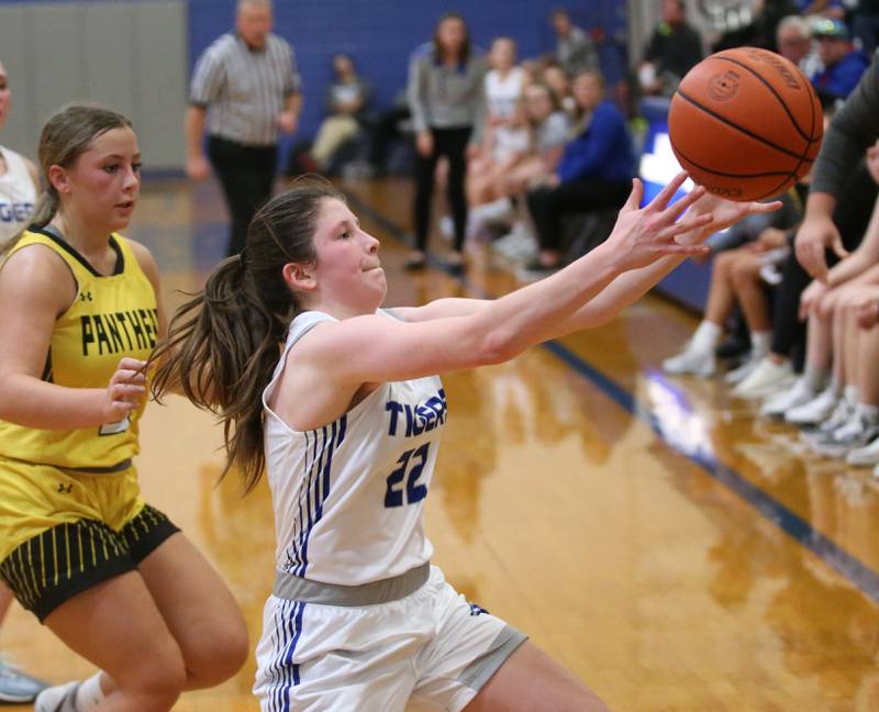 Princeton's Camryn Driscoll chases down a ball as Putnam Counth's Gabby Doyle defends during the Princeton High School Lady Tigers Holiday Tournament on Thursday, Nov. 16, 2023 at Prouty Gym.