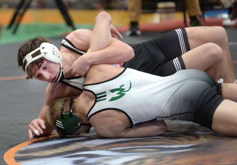 Stillman Valley's Henry Hildreth (top) holds West Carroll's Jonner Smith in the 150 pound title match at the 1A Byron Regional on Saturday, Feb. 8, 2025. Hildreth won the match.