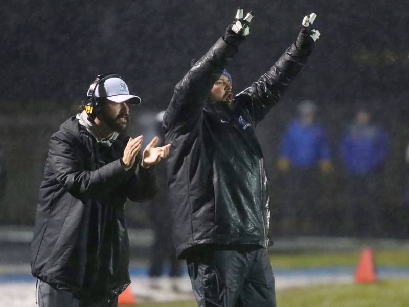 Burlington Central’s players and coaching staff react during win against Harlem in IHSA football Class 6A second-round playoff action at Central High School in Burlington on Saturday, November 8, 2025.