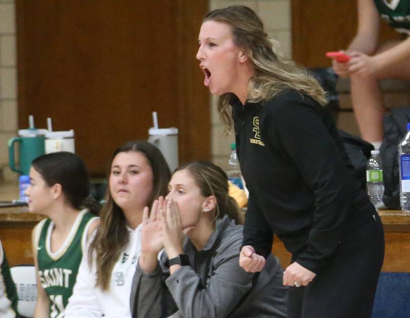 St. Bede head girls basketball coach Stephanie Mickley coaches her team against Marquette on Monday, Nov. 27, 2023 in Bader Gym at Marquette High School.