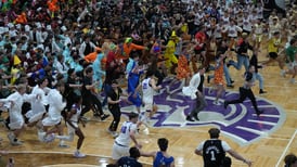 Princeton native John Washo works the famous ‘Silent Night’ game at Taylor University  