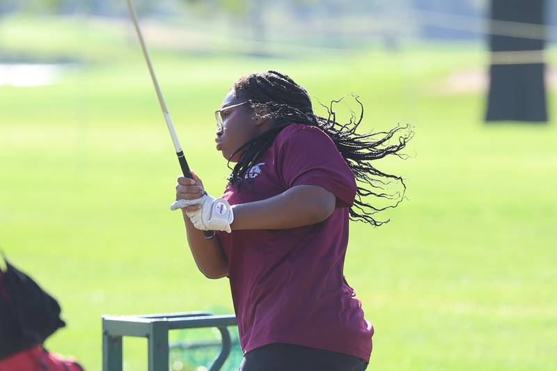 Kankakee's Shayla Jordan works on her drive before teeing off in the 2A Rich Township Regional girls golf tournament on Tuesday, Sept. 30, 2025 in University Park.