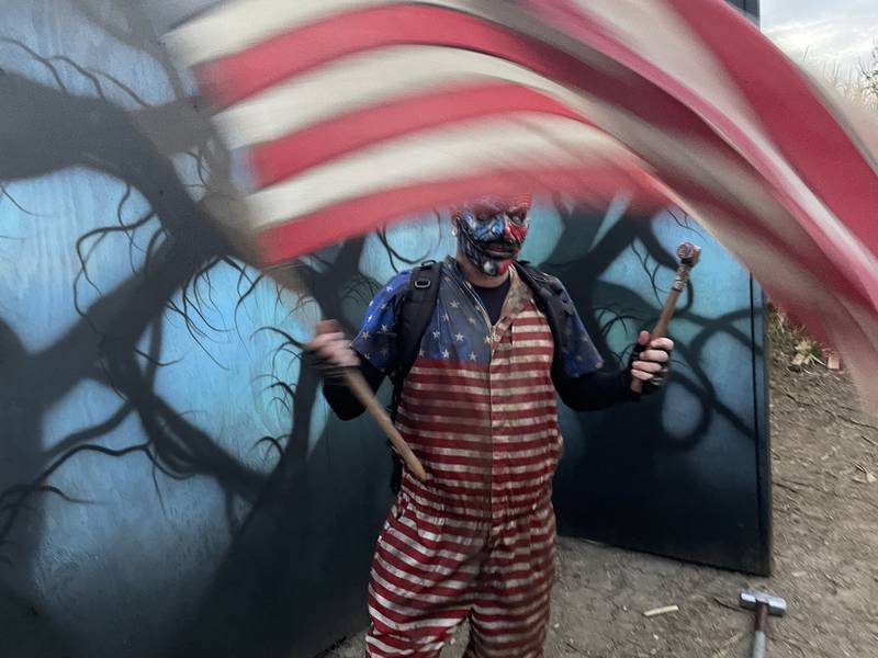 Nathan Bright of Oklahoma City portrays the main character "Stars" during an advance walk-through at the American Nightmare Scream Park, under construction in a cornfield adjacent to the Richardson Adventure Farm in Spring Grove.