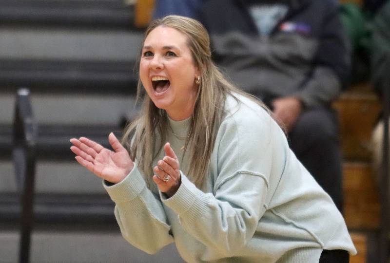 Woodstock North’s Head Coach Rebekah Sellek guides the Thunder against Crystal Lake Central in IHSA girls volleyball Class 3A Regional action at Woodstock High School in Woodstock on Thursday, October 30, 2025.