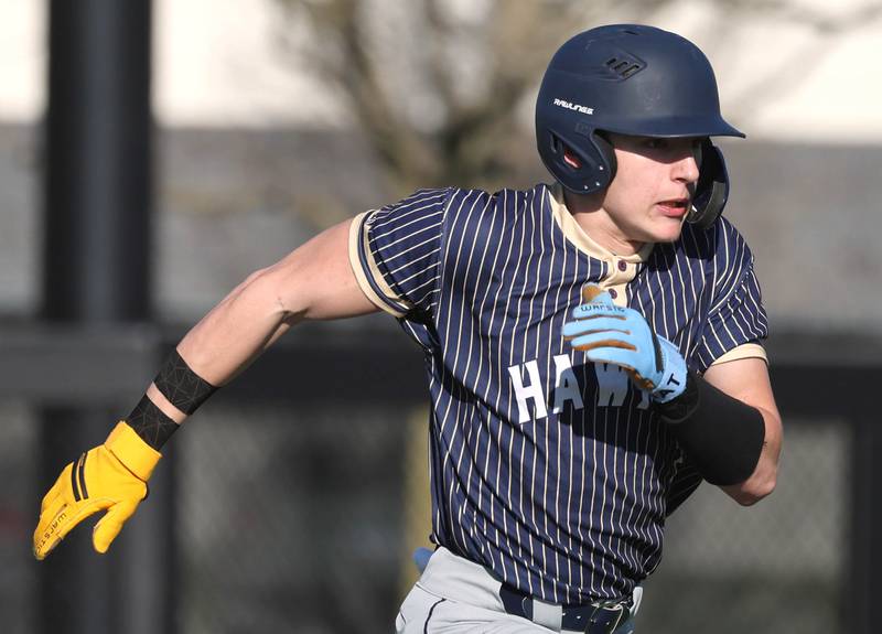 Hiawatha's Tim Pruitt hustles to first during their game against South Beloit Thursday, April 16, 2026, at Northern Illinois University in DeKalb.