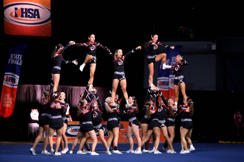 Members of the Lincoln-Way West cheerleading team compete in the large team division of the IHSA State Finals on Saturday, Feb. 8, 2025 at Grossinger Motors Arena in Bloomington.