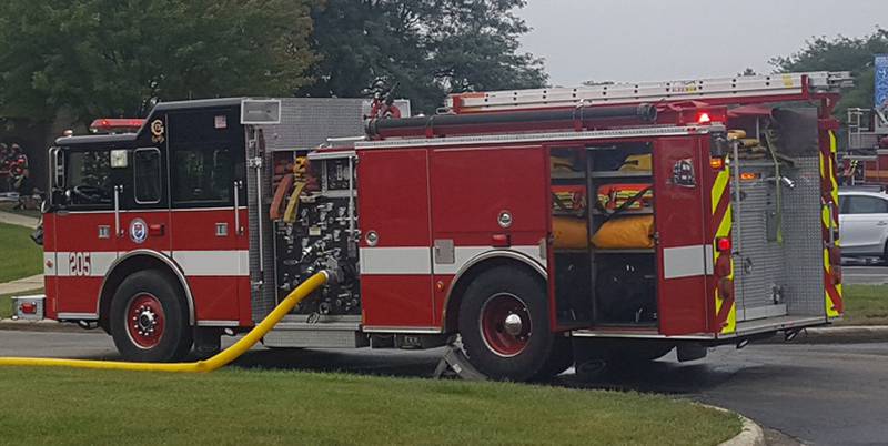 Fire trucks are seen at the John B. Norris Recreation Center in St. Charles – located on the campus of St. Charles East High School – on Aug. 21, 2017.