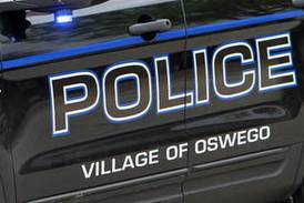 Woman found dead inside Oswego home, suspect in custody