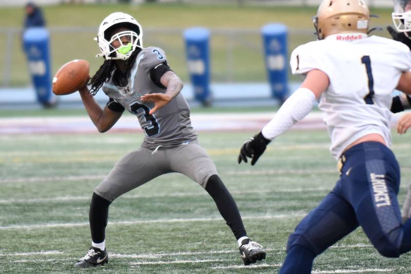 Kankakee's Cedric Terrell III throws a pass for what would become a 54-yard touchdown to Ezekiel Sherrod during the Kays' home game against Lemont in the first round of the IHSA Class 5A playoffs Saturday, Nov. 1, 2025.