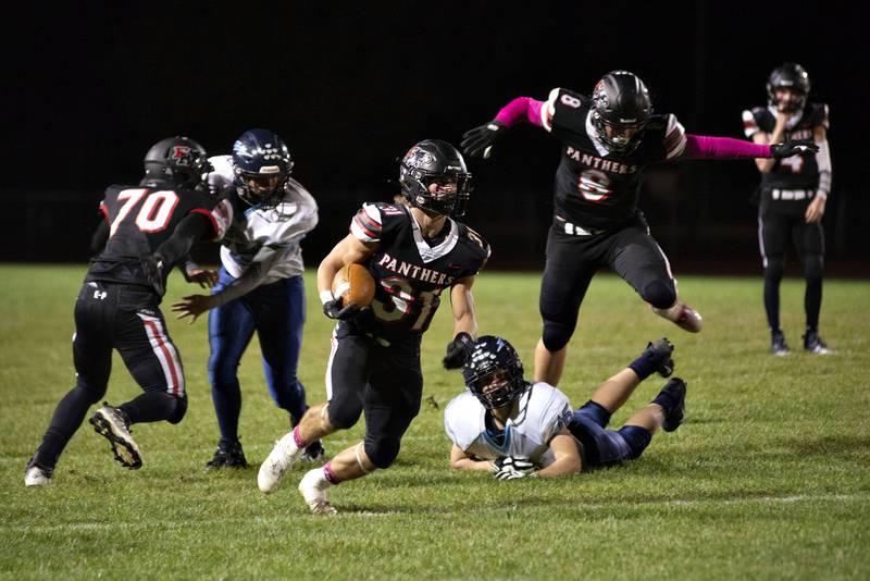 Erie-Prophetstown’s Jase Grunder runs for yards against Bureau Valley Friday, Oct.7, 2022.